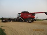 CaseIH 9230 on Tracks with a Macdon FD 75 Flex Draper Head    Would like to sell as a pair.
