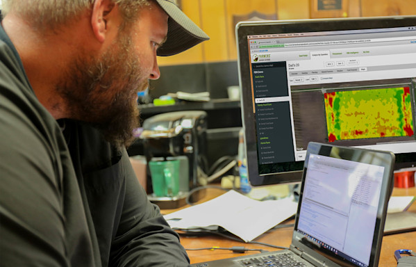 Farmer in Office with Laptop (2)