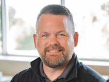 Headshot of FBN Finance's Kurt Downs